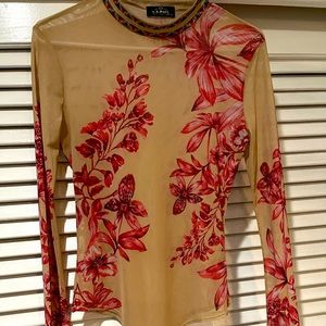 Long sleeve see through top great condition wore once size small stretchy